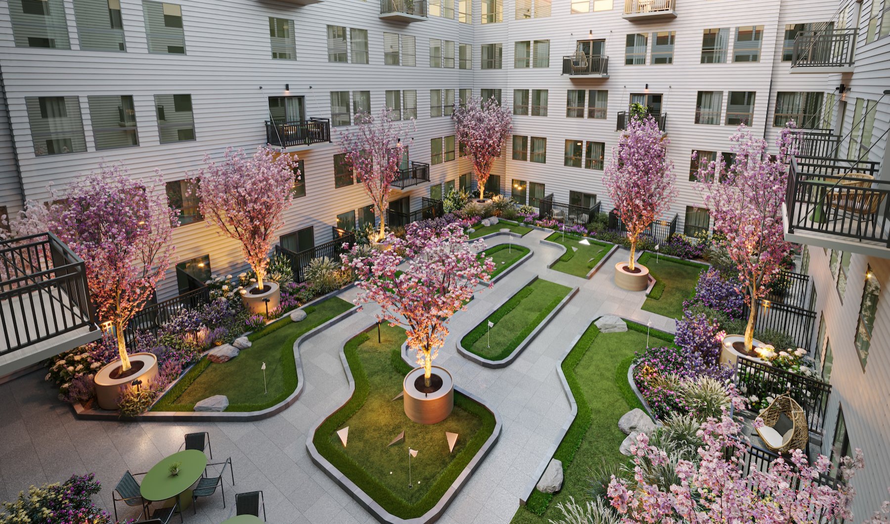 a courtyard with trees and buildings